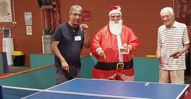 From left Naveed Aslam with Santa (Team Leader Colin Smith) and Kevin Nix