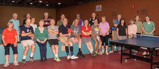 Some of the 2022 Table Tennis players. Musician, Eric Klay, is sixth from the left at the front. 