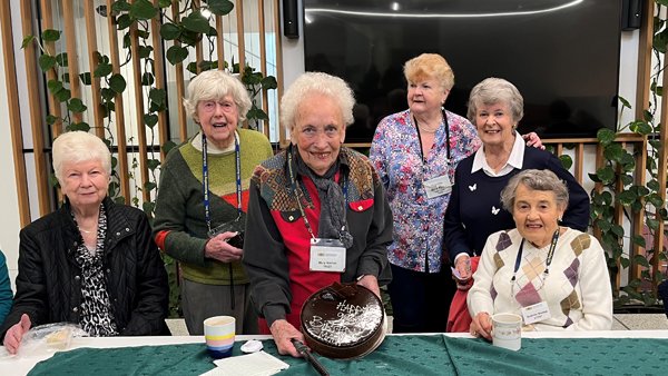 Mary Nathan (centre) celebrates her 99th birthday with members of her Eastern Mahjong class